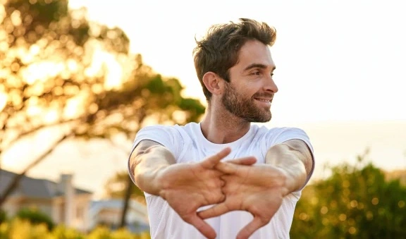Happy man enjoying a healthy lifestyle