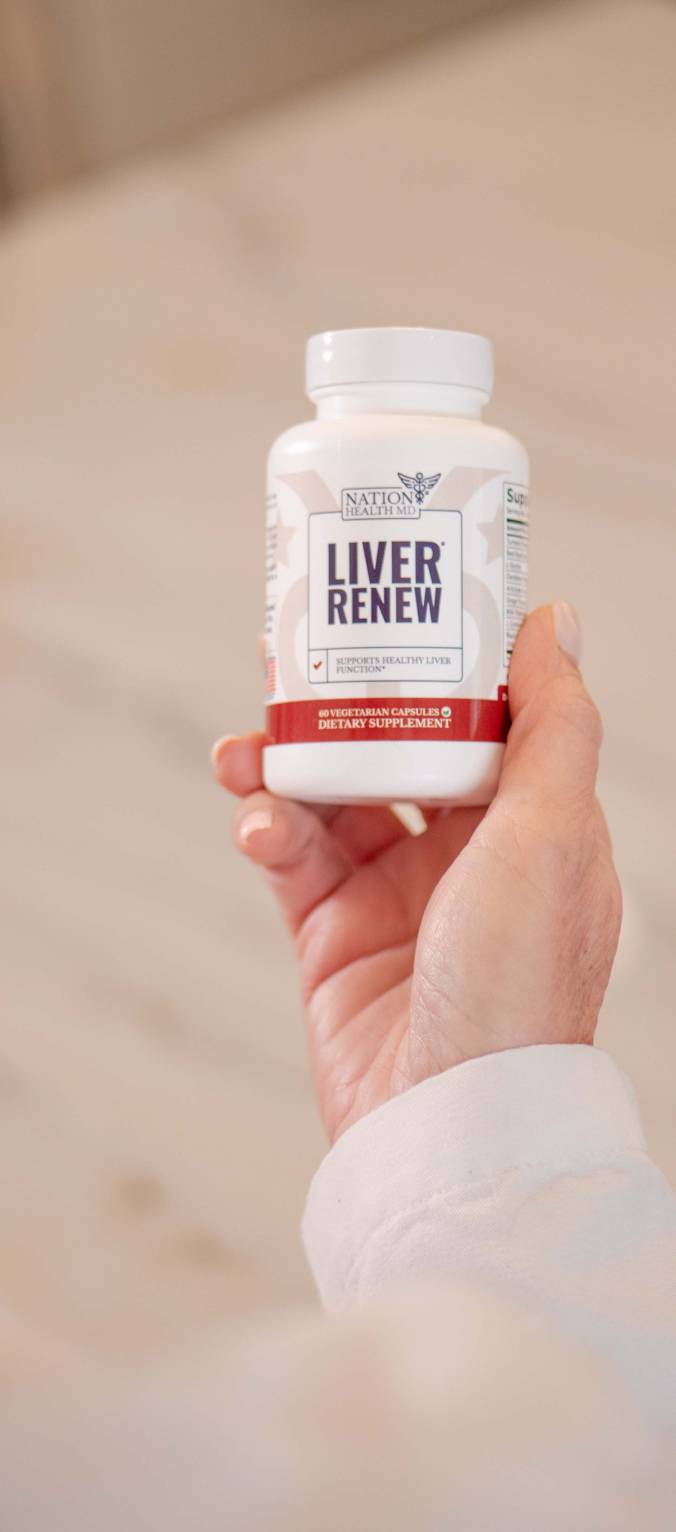Liver Renew bottle in hand