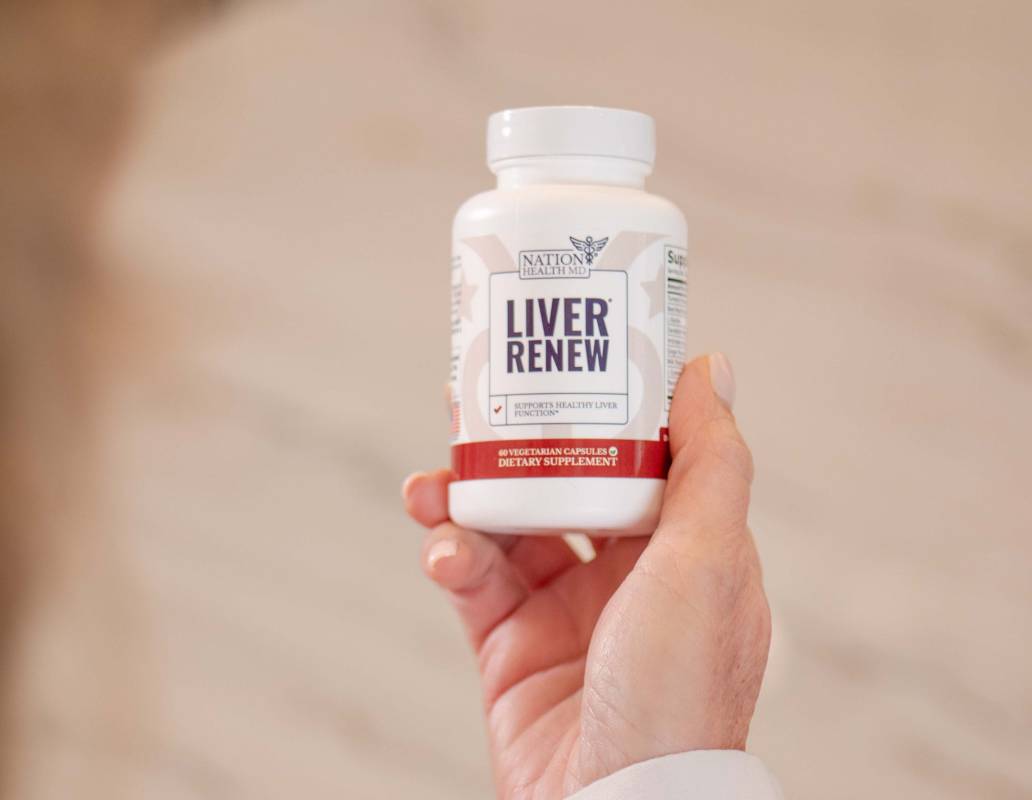 Liver Renew bottle in hand