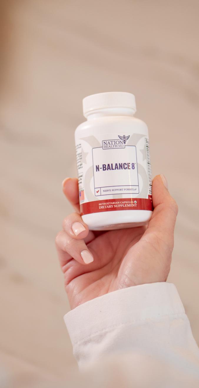 N-Balance 8 bottle in hand